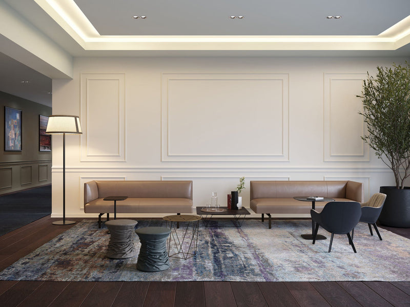 Loungebereich mit Sofa Jaan, BeistelltischJoco und Oki Table, dazu Sessel Sheru, alles von Walter Knoll.